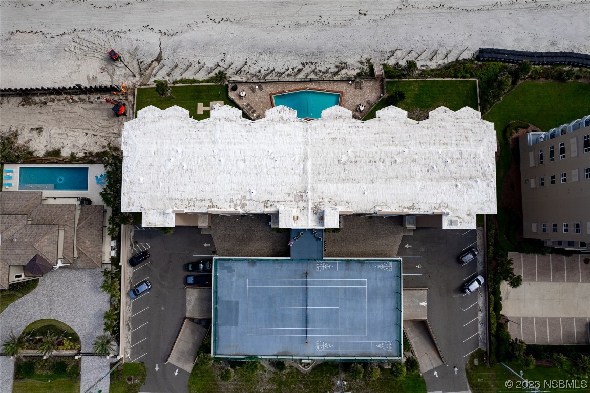 4745 South Atlantic Avenue, Unit 4030 Ponce Inlet, FL 32127 - Photo 30 of 47 an aerial view of multiple houses with outdoor space