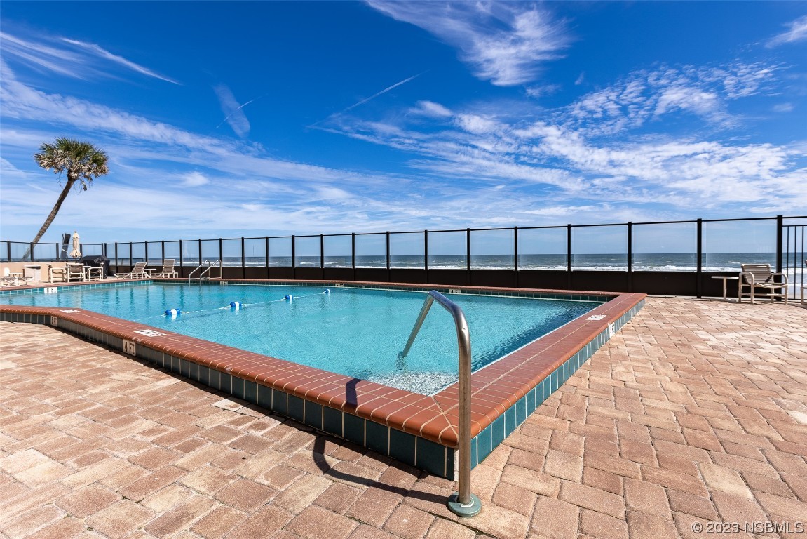 4745 South Atlantic Avenue, Unit 4030 Ponce Inlet, FL 32127 - Photo 44 of 47 a view of swimming pool with seating area