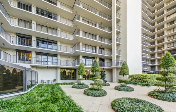 a front view of a multi story residential apartment building
