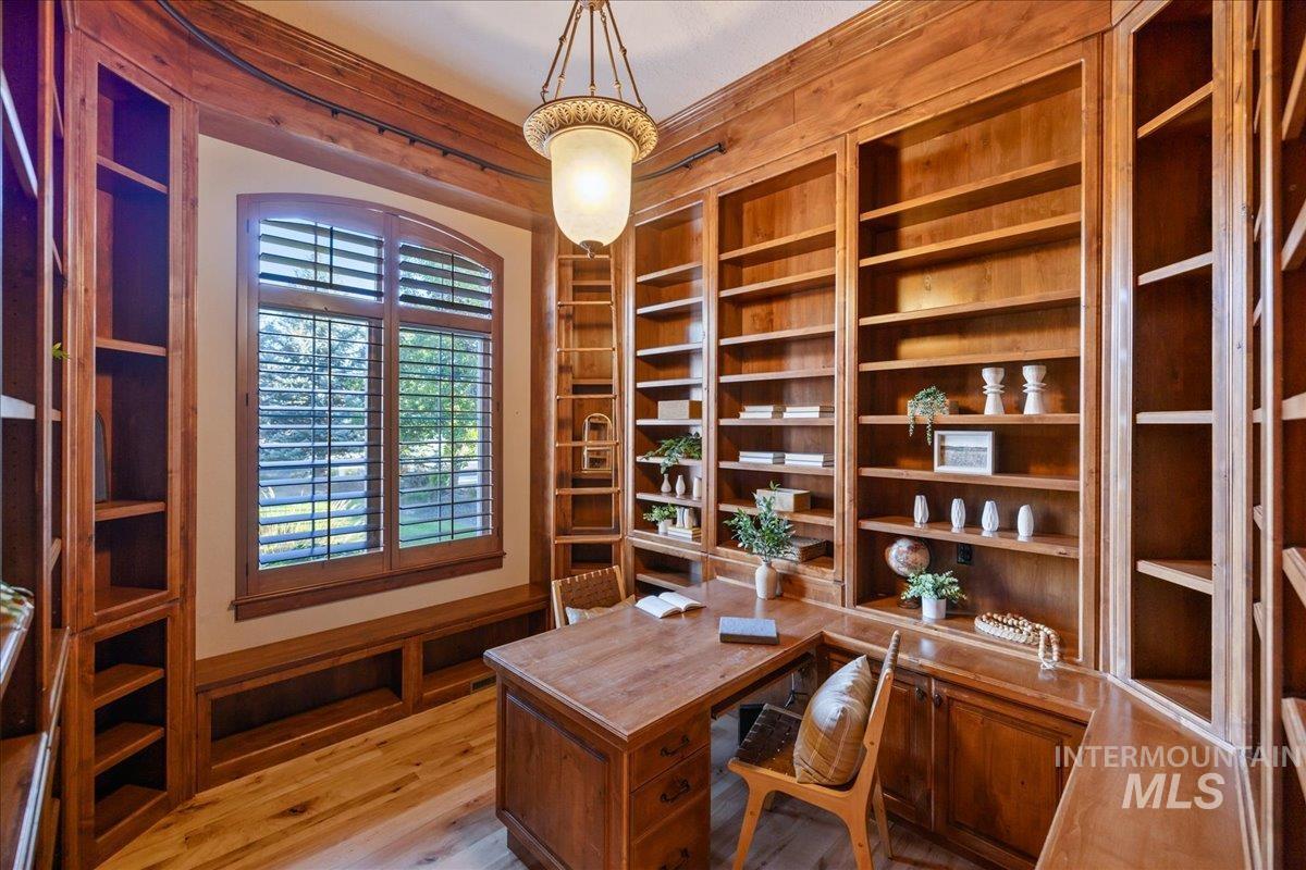 1479 West Oakhampton Drive Eagle, ID 83616 - Photo 24 of 49 Office area with built in features and light wood-type flooring