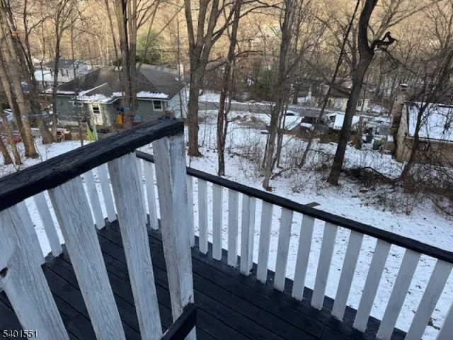 a view of a porch with a bench
