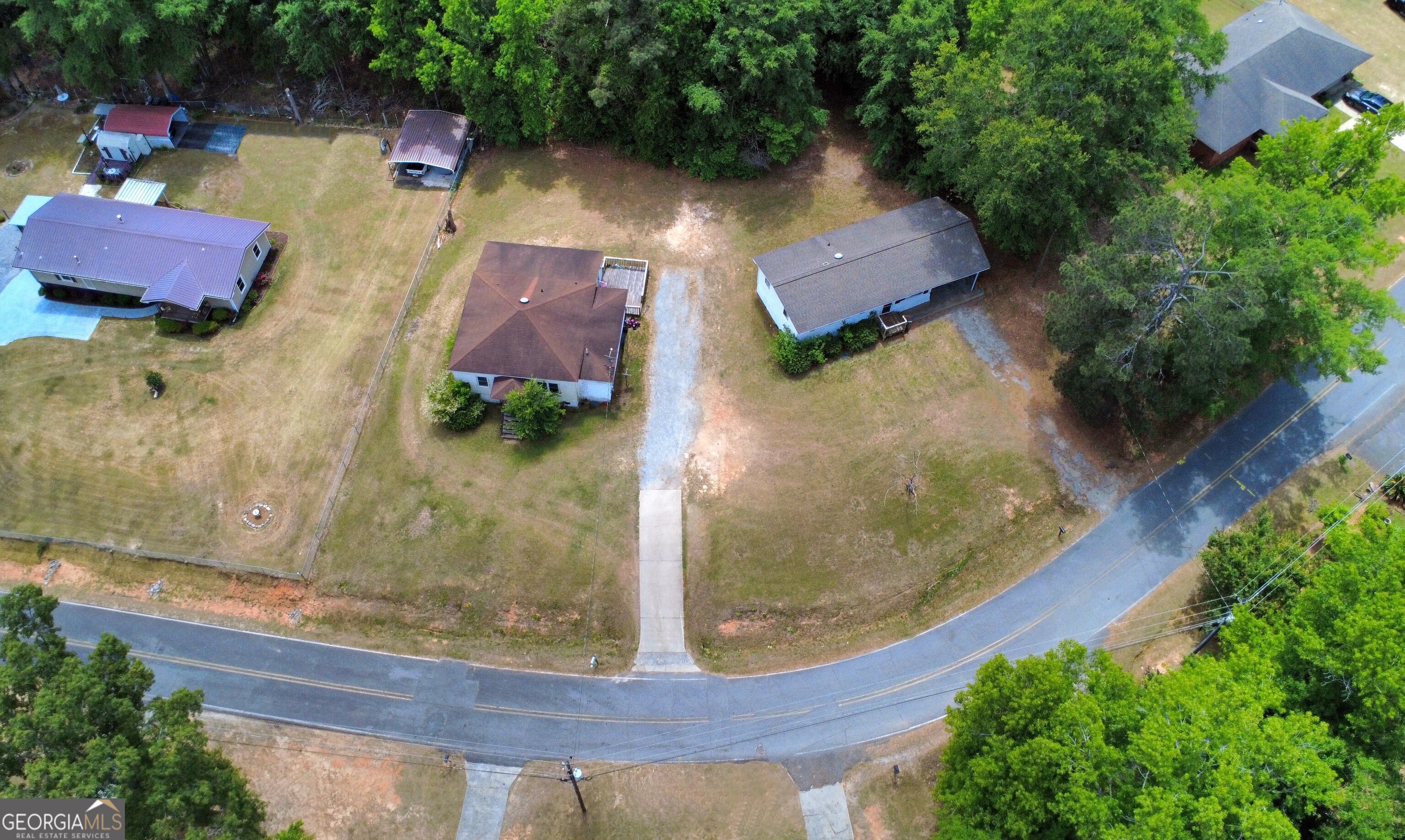 193 Frazier Drive Southeast Milledgeville, GA 31061 - Photo 37 of 38 an aerial view of a house with garden space and street view