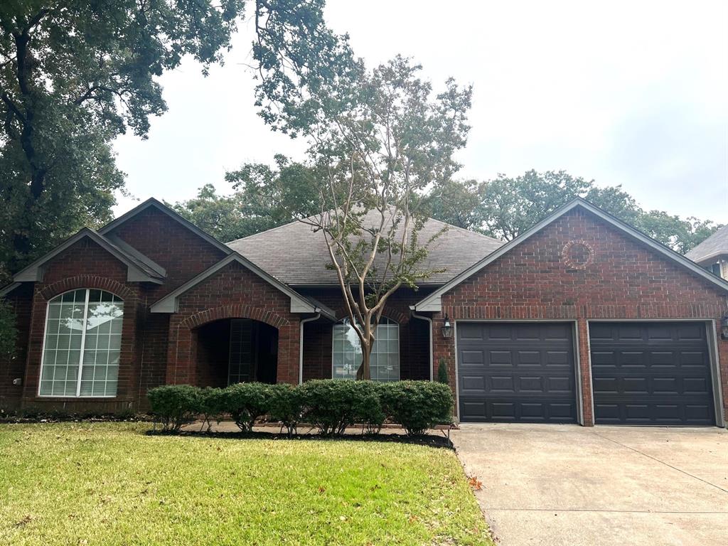 537 Post Oak Road Grapevine, TX 76051 - Photo 1 of 1 a front view of a house with a yard