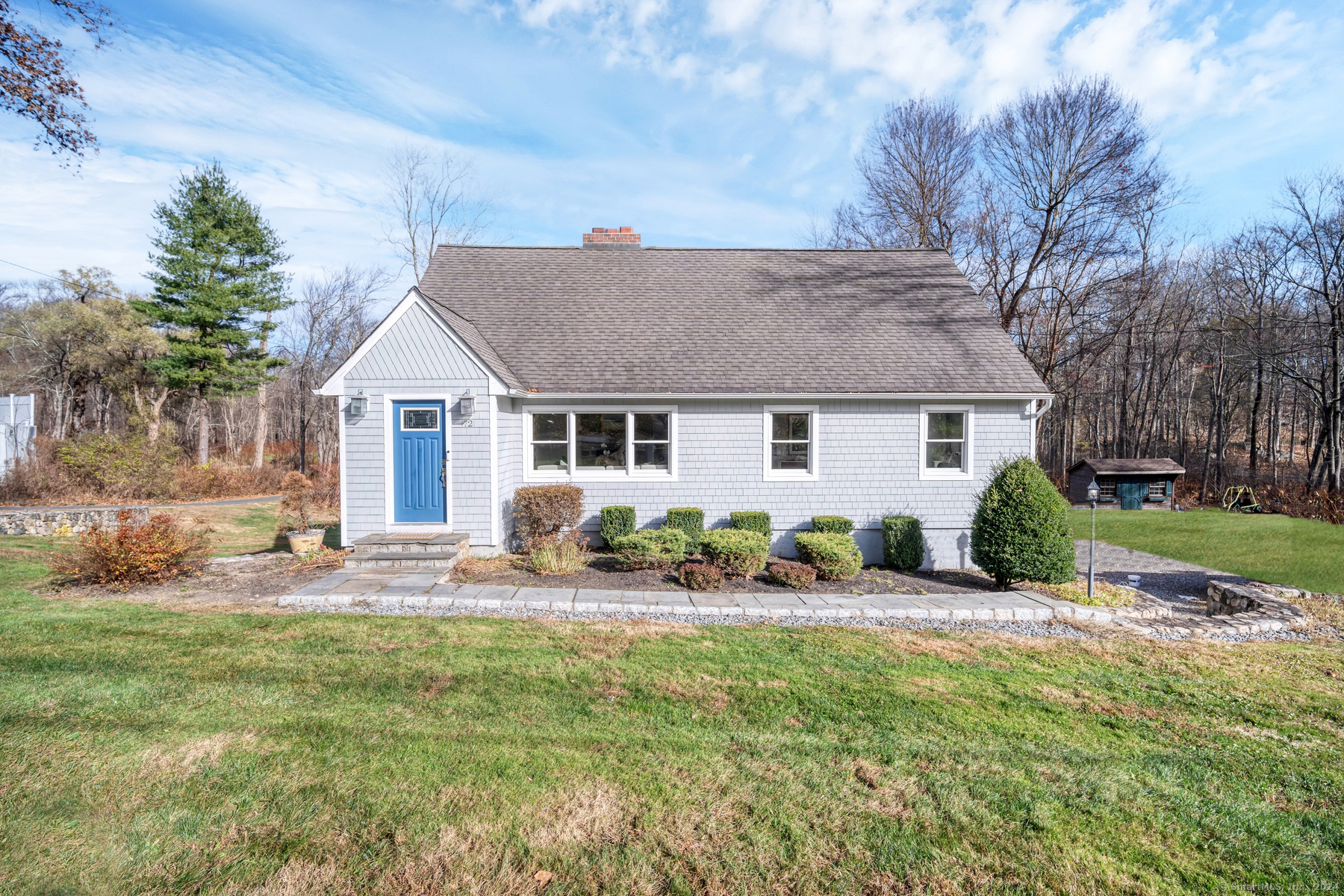 72 Harvey Road Ridgefield, CT 06877 - Photo 1 of 1 a view of a house with a yard