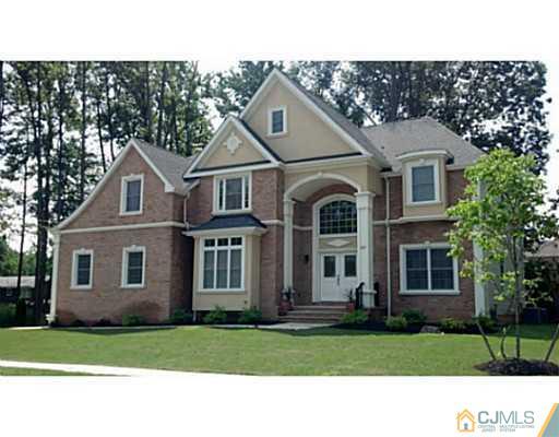 785 Old Raritan Road Edison, NJ 08820 - Photo 1 of 1 a front view of a house with a garden
