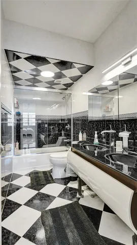 a kitchen with a sink and a stove