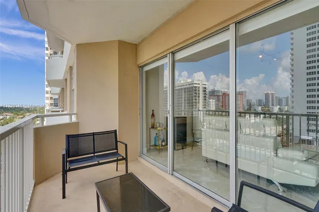 a view of a city with tall buildings