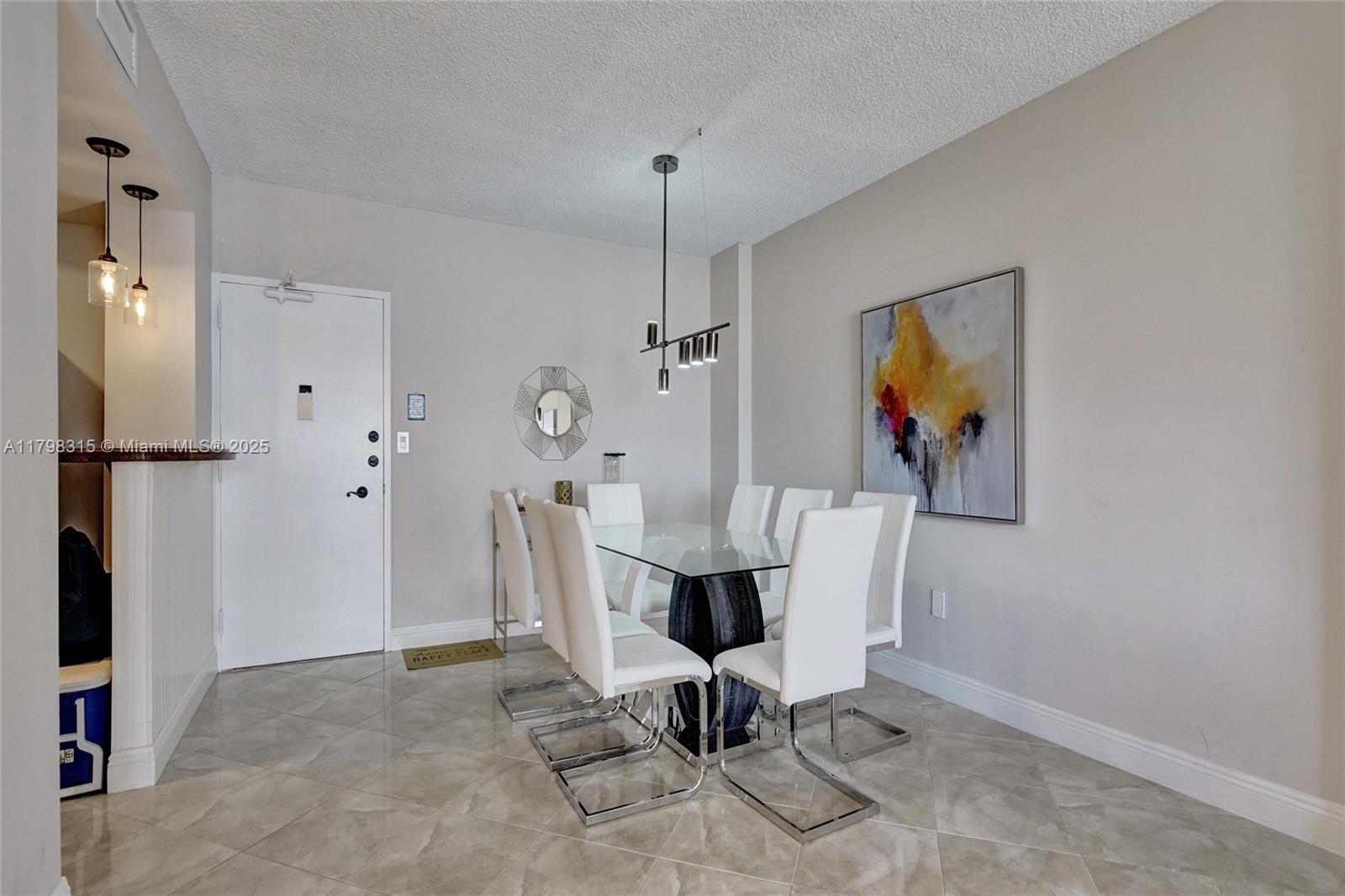 1980 South Ocean Drive, Unit 7J Hallandale Beach, FL 33009 - Photo 7 of 33 a view of a workspace with furniture and a window