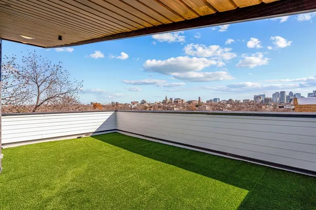 a view of a building with a street