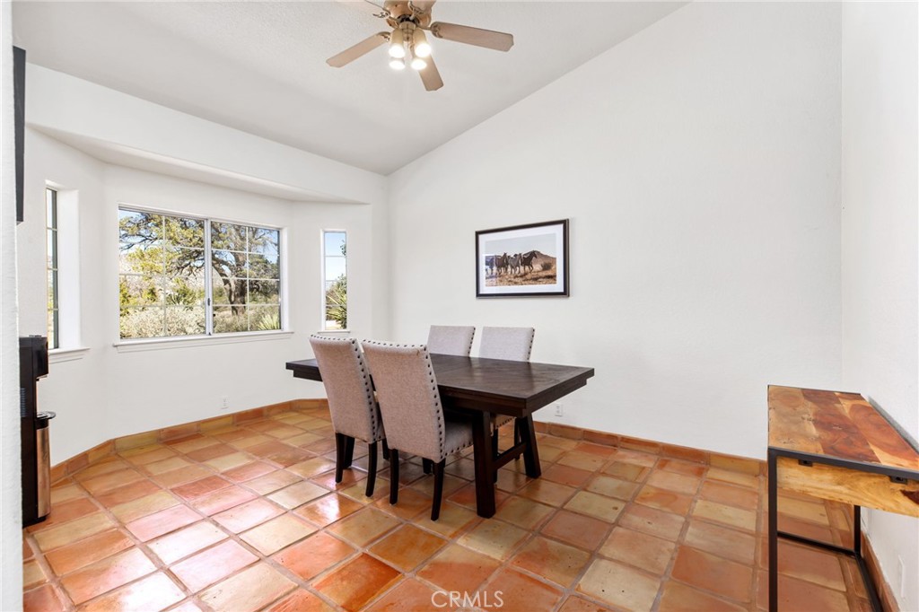 69945 Pinesmoke Road Mountain Center, CA 92561 - Photo 12 of 25 a view of a dining room with furniture