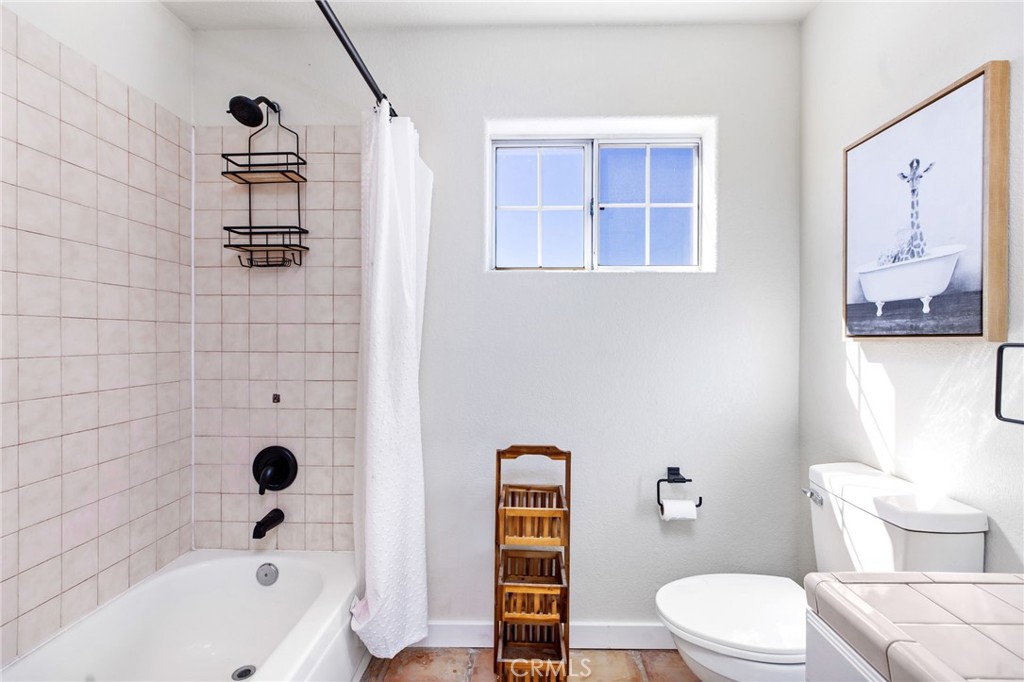 69945 Pinesmoke Road Mountain Center, CA 92561 - Photo 17 of 25 a bathroom with a sink a toilet and shower