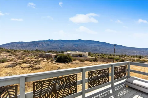 a view of a terrace with mountain view