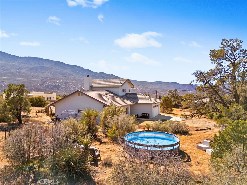 69945 Pinesmoke Road Mountain Center, CA 92561 - Photo 24 of 25 a view of a houses with a yard