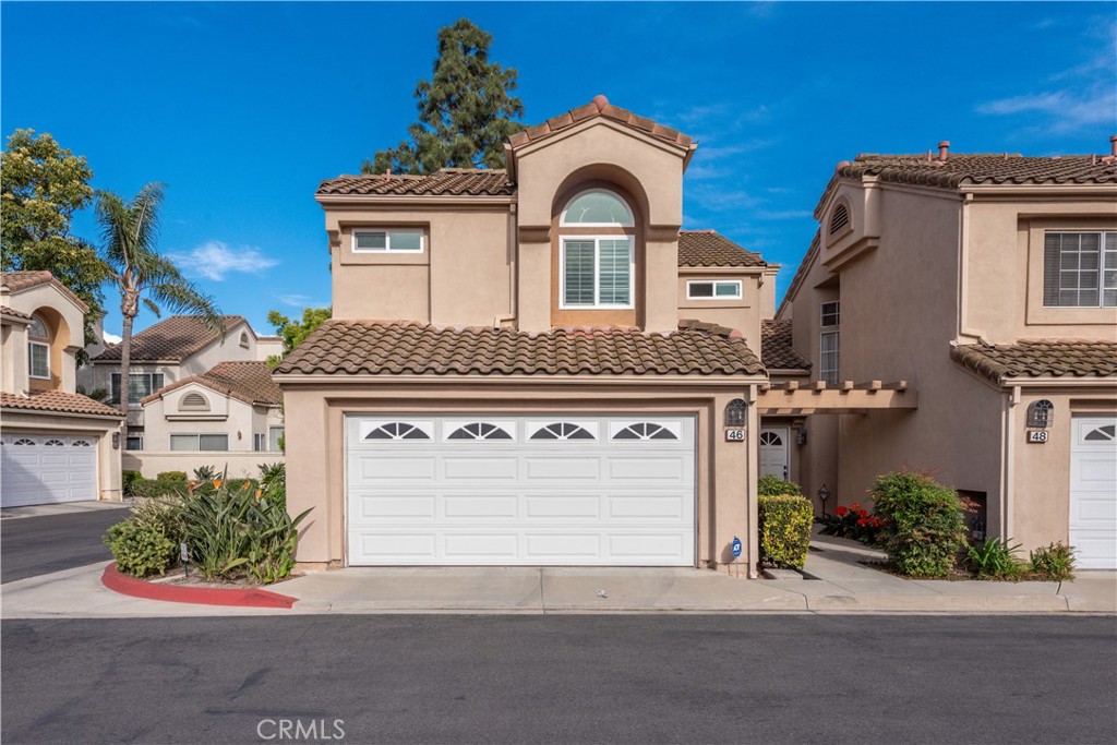 front view of a house with a street