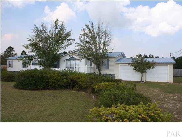 9848 American Farms Road Milton, FL 32583 - Photo 1 of 21 Front View of Home