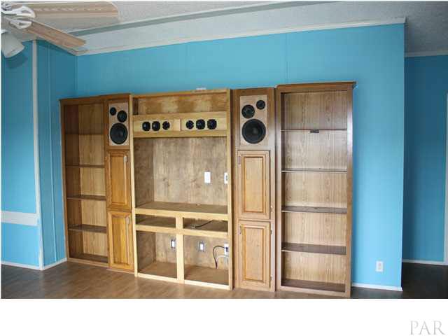 9848 American Farms Road Milton, FL 32583 - Photo 12 of 21 Built in Entertainment Center in Living Area