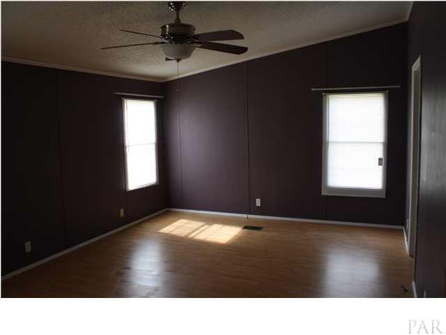 9848 American Farms Road Milton, FL 32583 - Photo 18 of 21 Master Bedroom