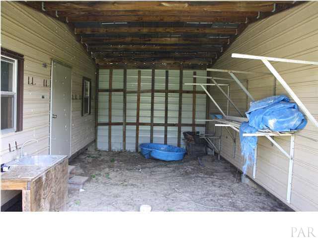 9848 American Farms Road Milton, FL 32583 - Photo 9 of 21 Inside Barn V2