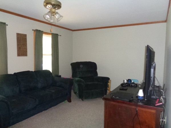 220 Dana Road Orange, MA 01364 - Photo 4 of 9 a living room with furniture and a mirror