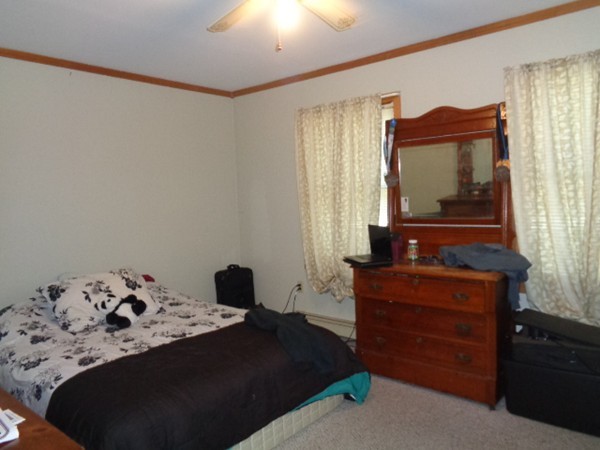 220 Dana Road Orange, MA 01364 - Photo 5 of 9 a bedroom with a bed and a dresser