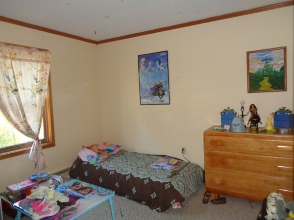 220 Dana Road Orange, MA 01364 - Photo 6 of 9 a bedroom with a bed and a window