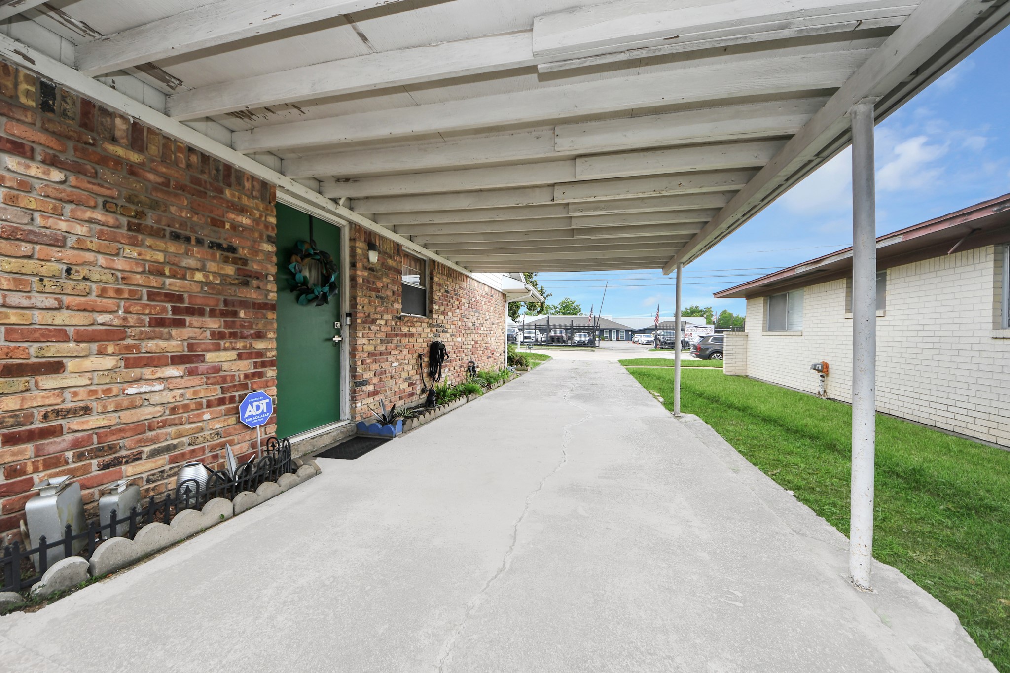 3901 Jeanetta Street Houston, TX 77063 - Photo 33 of 41 Carport on the driveway to allow for easy unloading into the kitchen/breakfast area.
