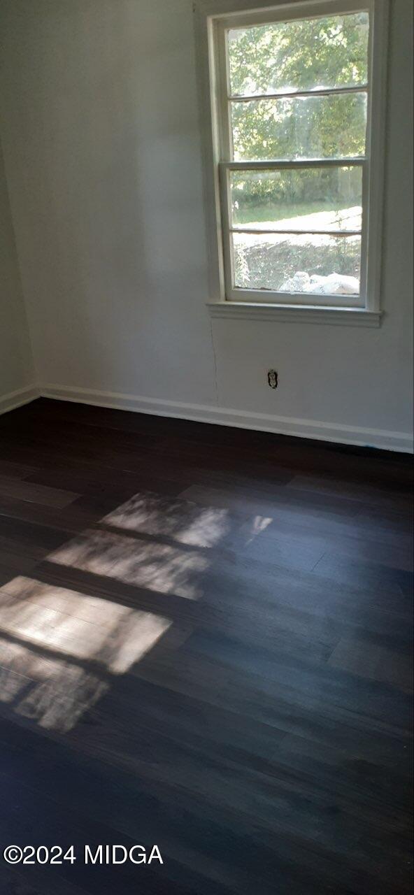 2846 Walker Street Columbus, GA 31903 - Photo 13 of 16 a view of empty room with wooden floor and fan