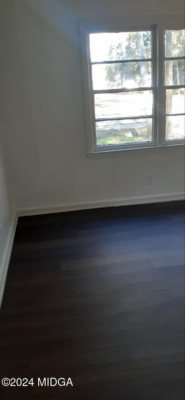 2846 Walker Street Columbus, GA 31903 - Photo 14 of 16 a view of a livingroom with an empty space and a window