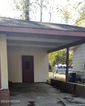 a view of a living room and window