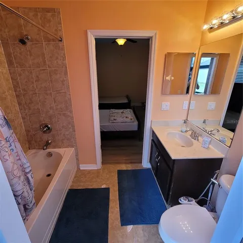 a view of a living room with a large window