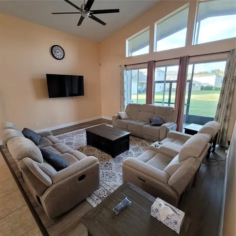 a bedroom with a bed dresser and a window