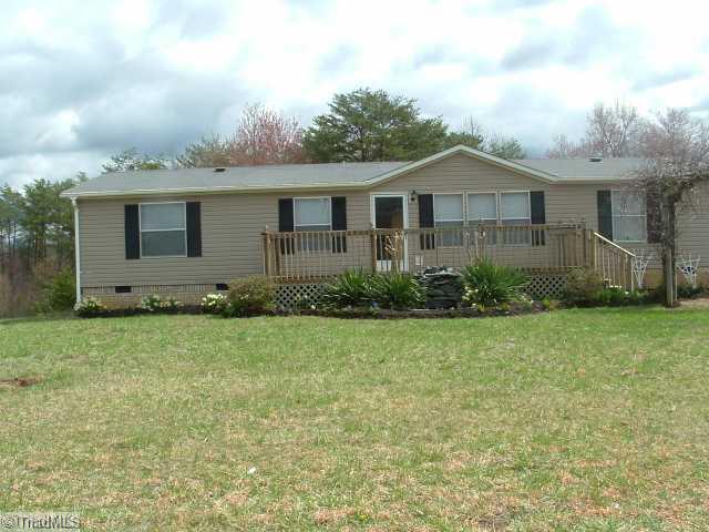 1050 Hill Road King, NC 27021 - Photo 14 of 15 Exterior Front. View of Front Deck