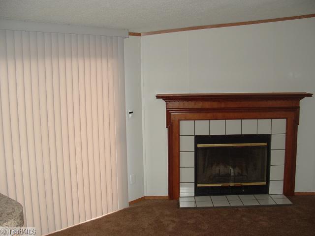1050 Hill Road King, NC 27021 - Photo 4 of 15 Living Room. Corner Fireplace