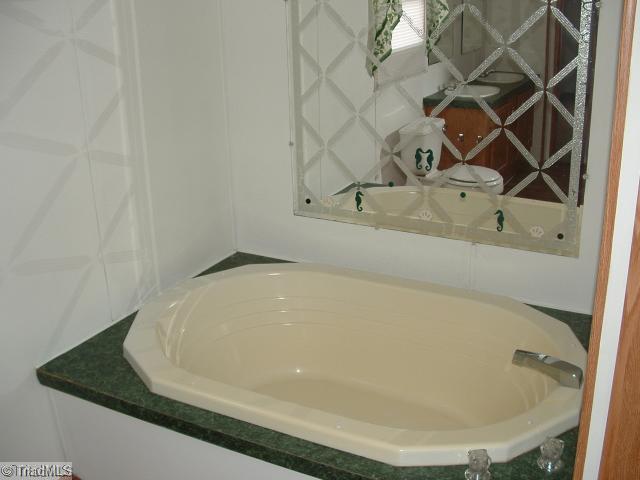 1050 Hill Road King, NC 27021 - Photo 9 of 15 Master Bath/Spa. Soak away the stress of the day in this over sized Garden Tub!