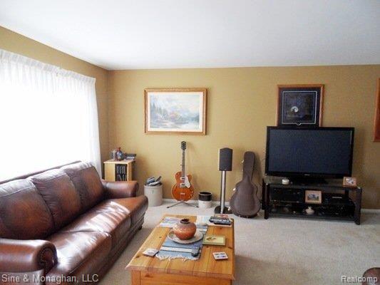 76 Stratford Lane, Unit 17 Rochester, MI 48309 - Photo 7 of 21 Freshly painted living room
