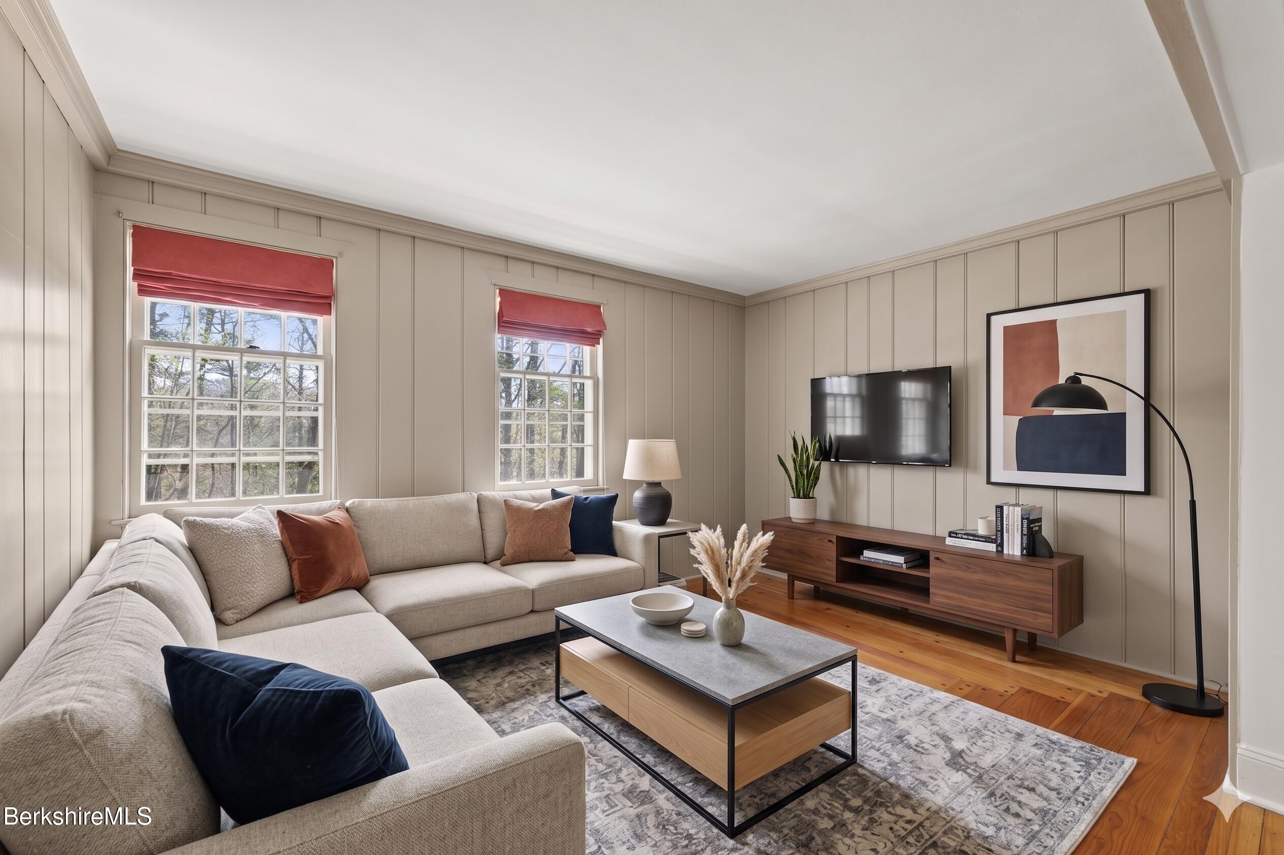 100 South Prospect Street Lee, MA 01238 - Photo 33 of 46 a living room with furniture and a flat screen tv