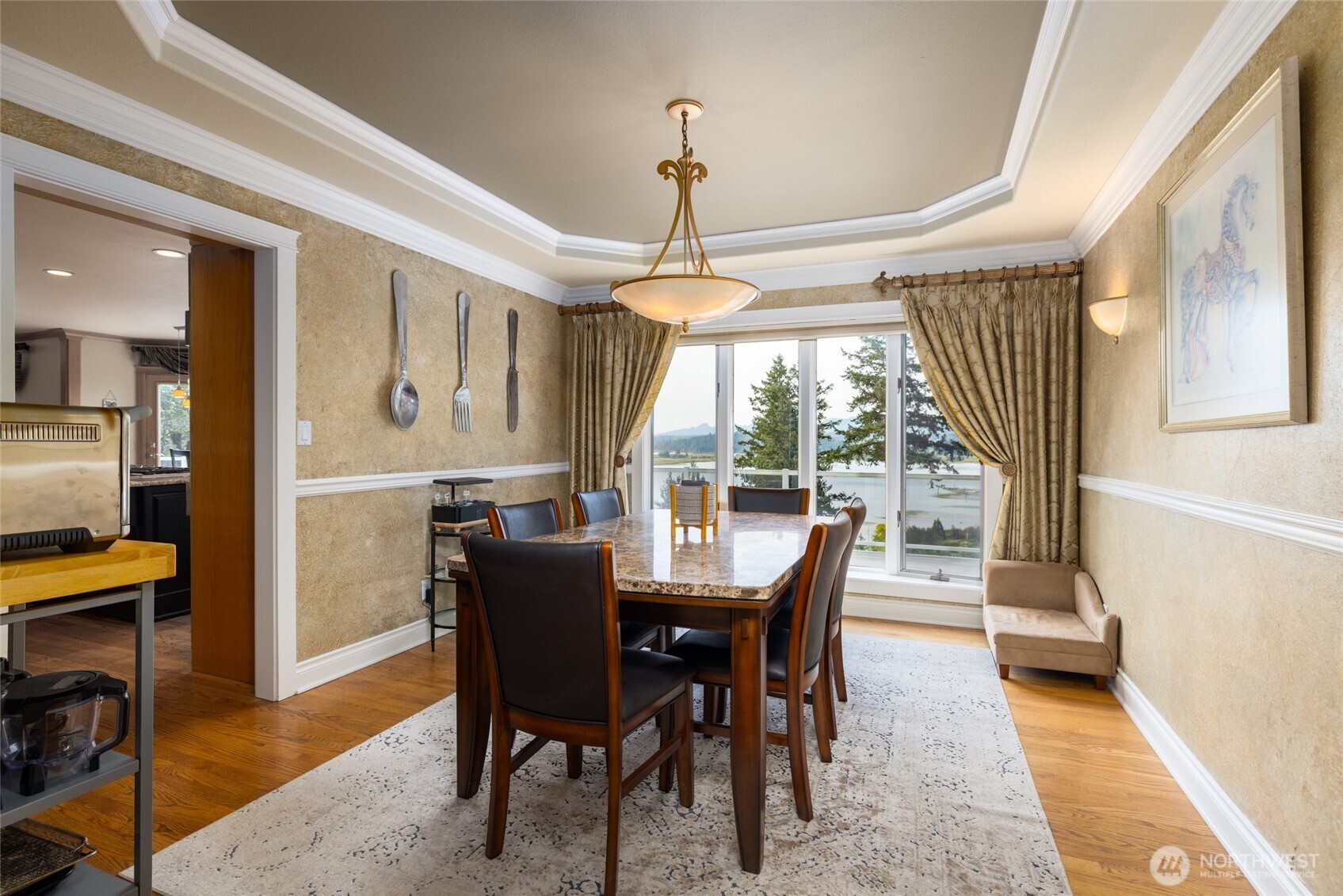24123 Old Day Creek Road Sedro-Woolley, WA 98284 - Photo 11 of 40 a dining room with furniture a chandelier and wooden floor