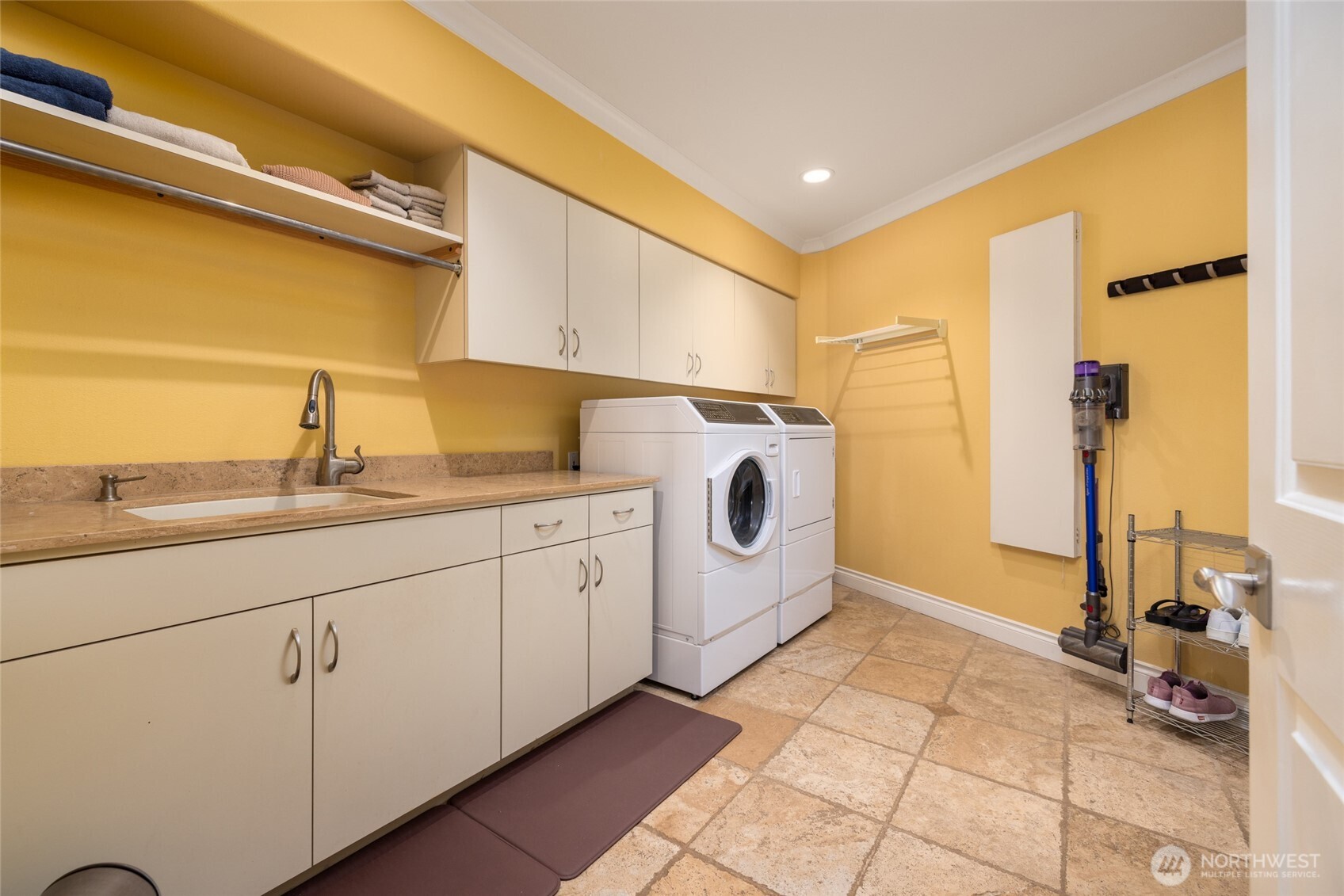 24123 Old Day Creek Road Sedro-Woolley, WA 98284 - Photo 18 of 40 a kitchen with cabinets a washer and dryer