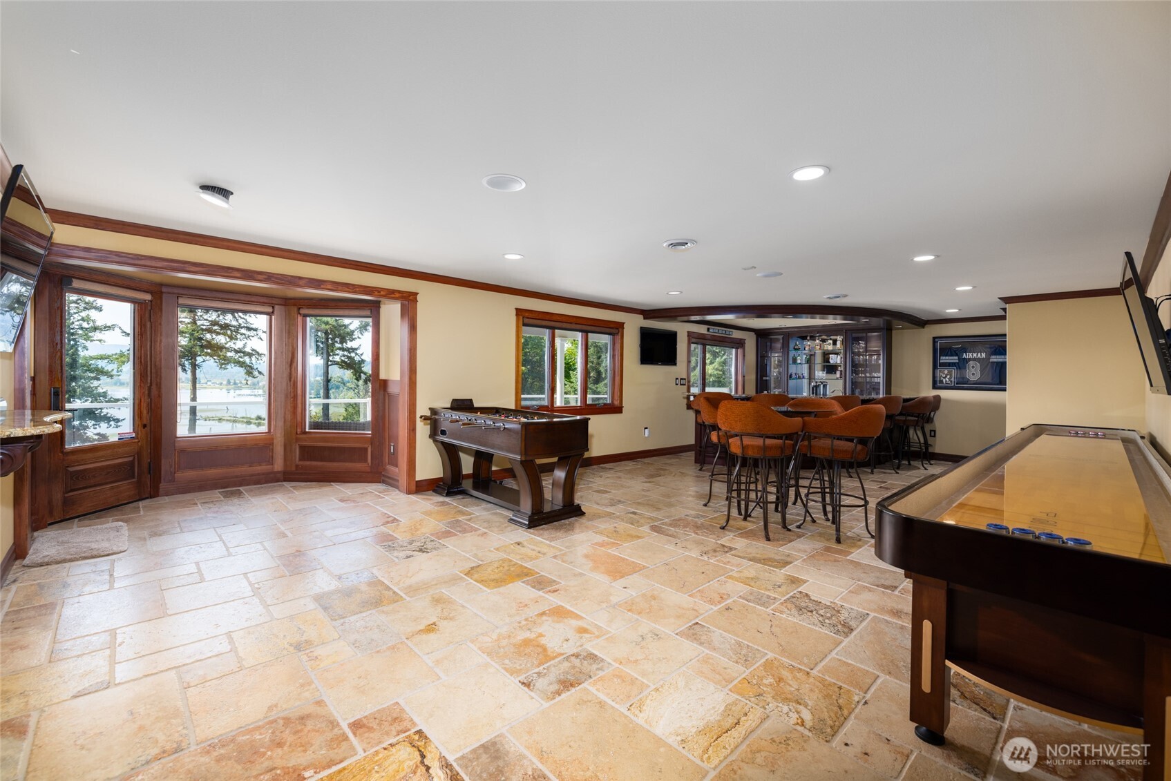 24123 Old Day Creek Road Sedro-Woolley, WA 98284 - Photo 28 of 40 a living room with furniture a large window and a flat screen tv