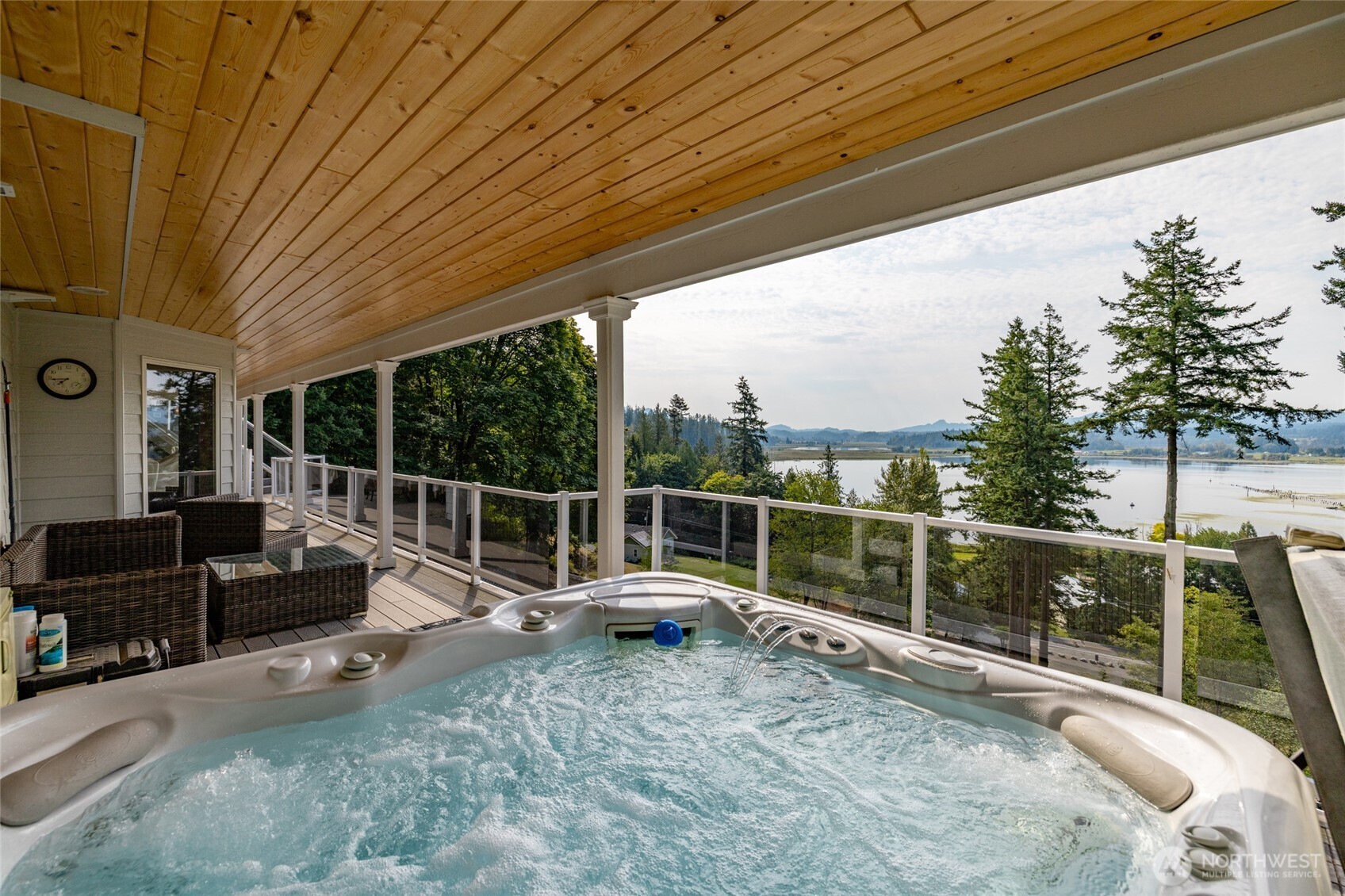 24123 Old Day Creek Road Sedro-Woolley, WA 98284 - Photo 36 of 40 a view of a chair and tables in the balcony