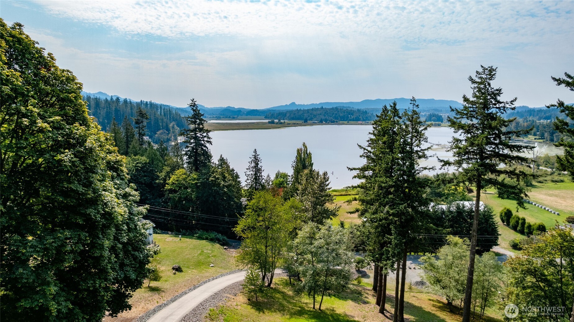24123 Old Day Creek Road Sedro-Woolley, WA 98284 - Photo 40 of 40 a view of a lake with a garden