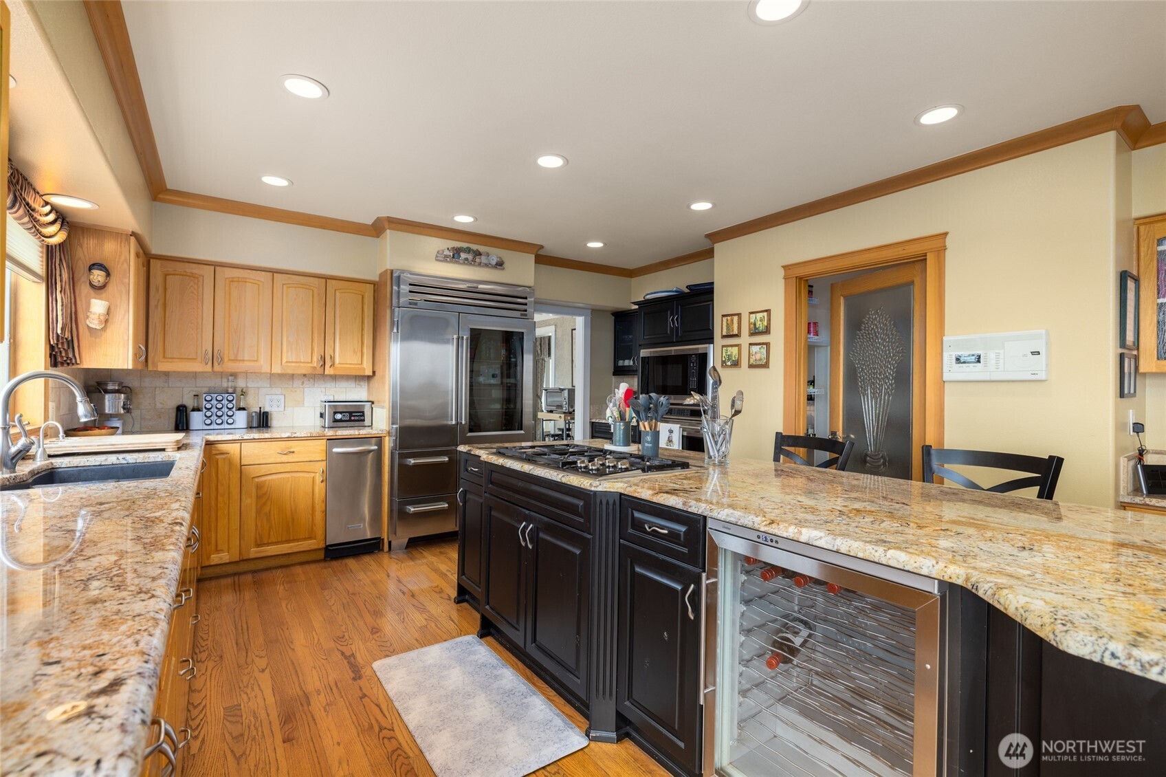 24123 Old Day Creek Road Sedro-Woolley, WA 98284 - Photo 6 of 40 a kitchen with granite countertop a sink cabinets and stainless steel appliances