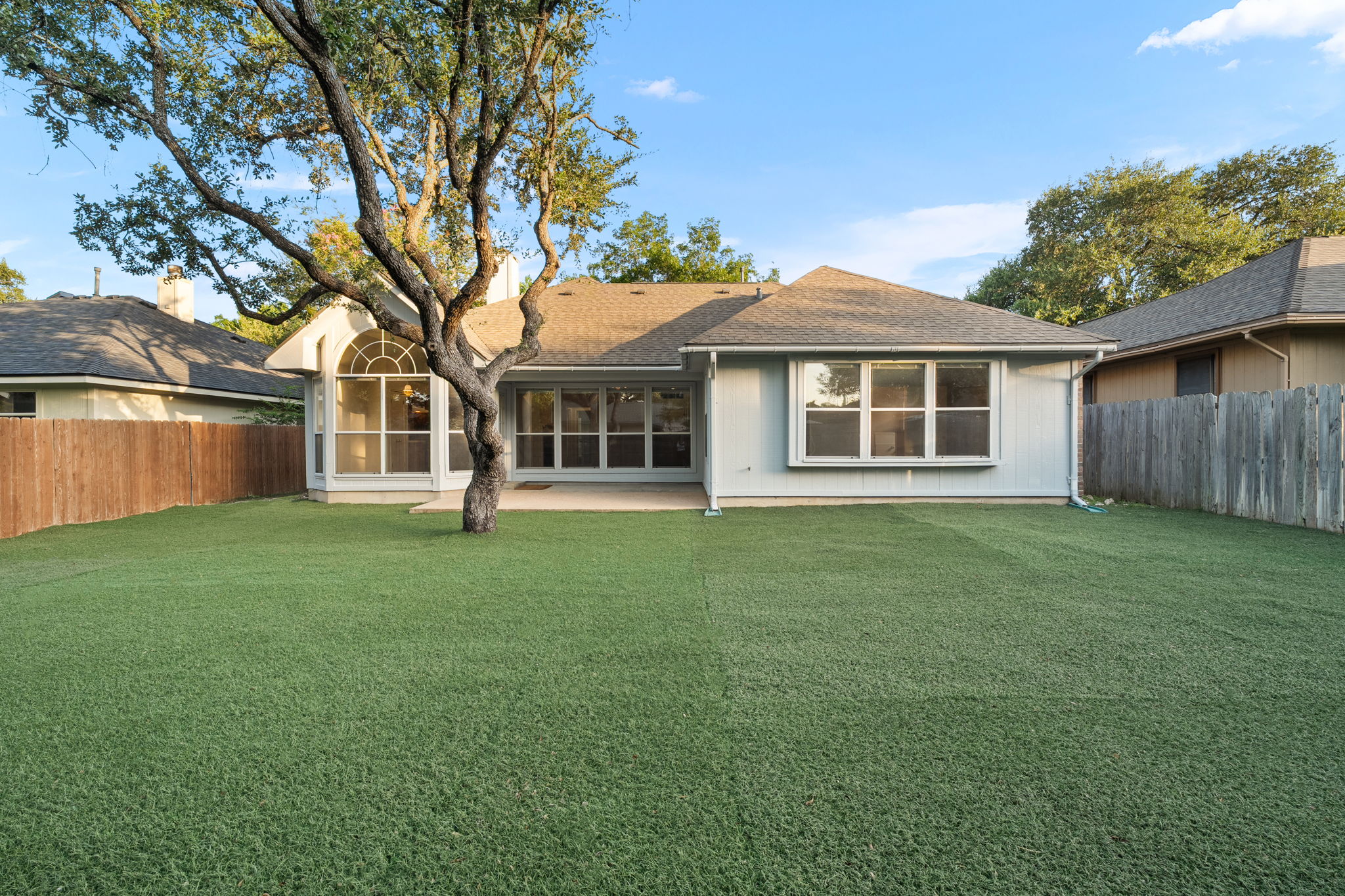 2802 Alexander Drive Leander, TX 78641 - Photo 21 of 29 Articifial turf creates a low maintenance and clean backyard.