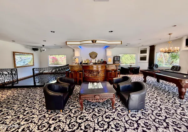 a view of a swimming pool with a patio