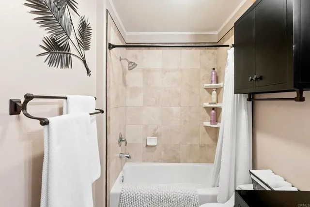 a view of a patio with table and chairs and potted plants