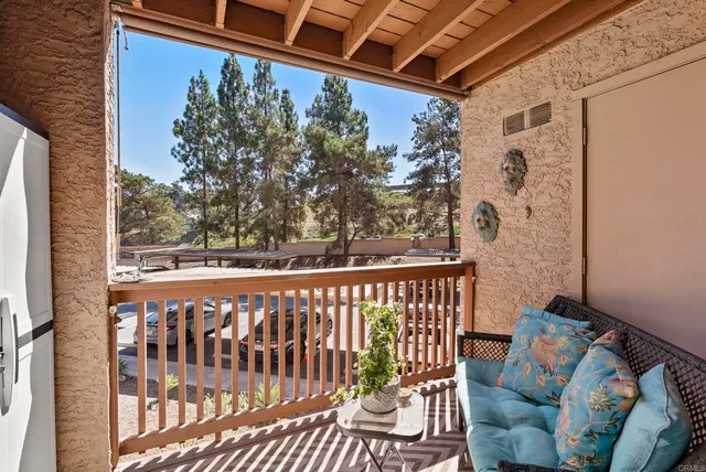 a view of a porch with furniture