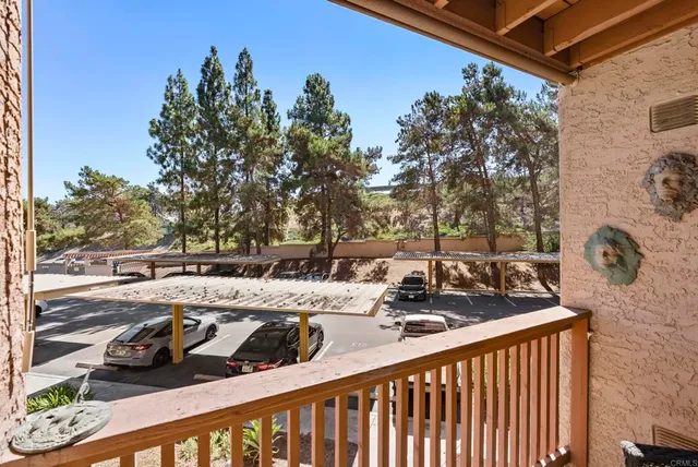 a view of a backyard with sitting area