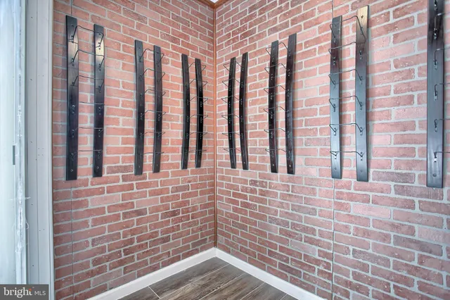 a view of a porch with wooden floor and stairs