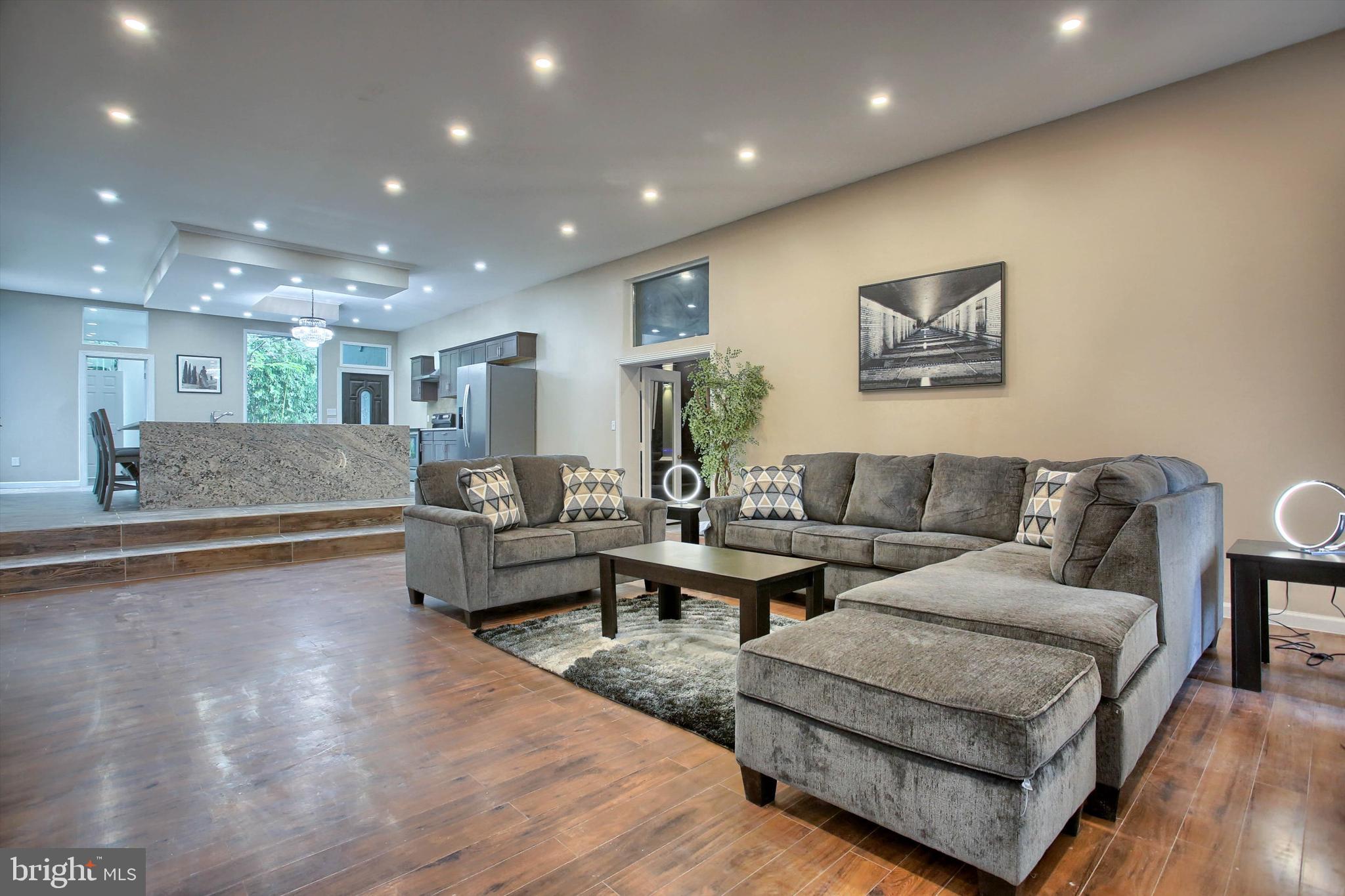 1813 Holly Drive Harrisburg, PA 17110 - Photo 17 of 61 a living room with furniture and a wooden floor