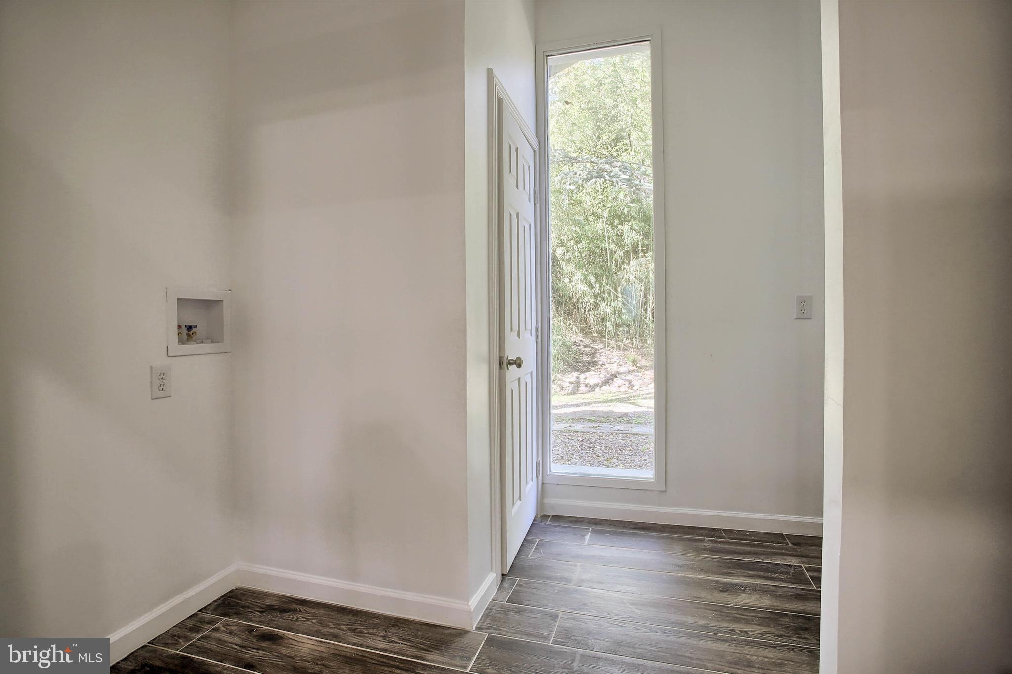 1813 Holly Drive Harrisburg, PA 17110 - Photo 33 of 61 a view of an empty room and window